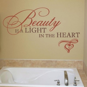 Quotes about beauty using custom vinyl wall lettering: Beauty is a light in the heart