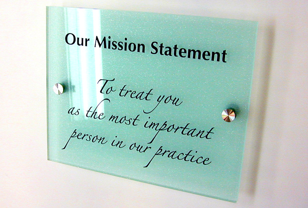 Mission-statement-vinyl-wall-simple-stencil-added-to-signage-for-display