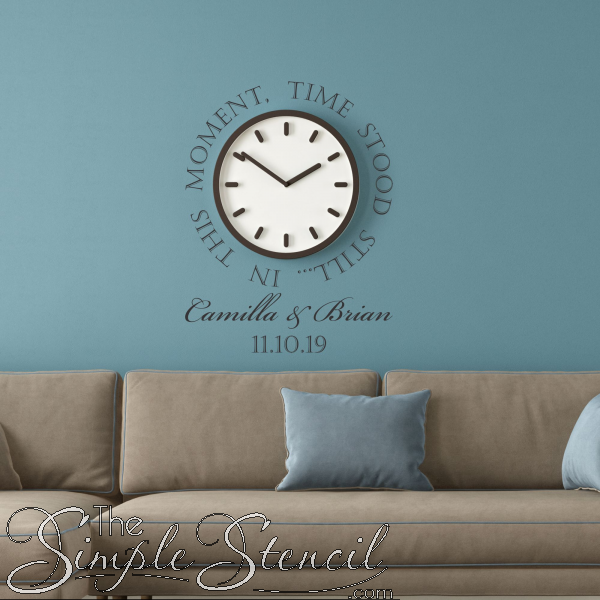A great wedding gift idea that can be personalized with the wedding couples names and wedding date to surround a clock and reads: In this moment time stood still. 